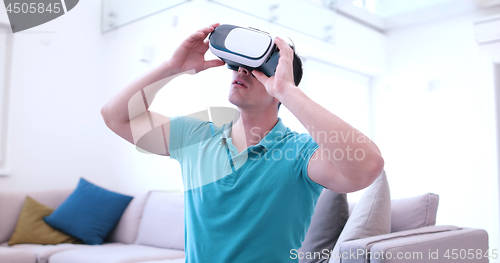 Image of man using VR-headset glasses of virtual reality