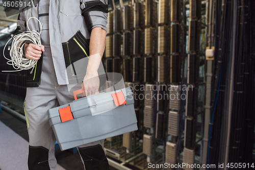 Image of Worker in telephone exchange