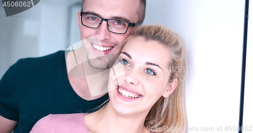 Image of young couple enjoying morning coffee