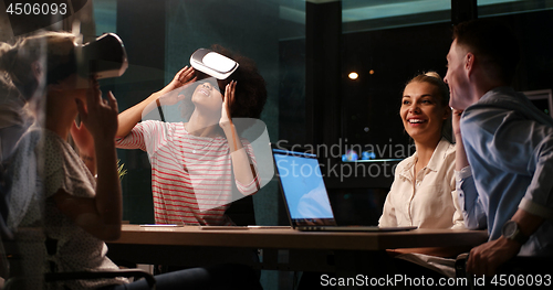 Image of Multiethnic Business team using virtual reality headset