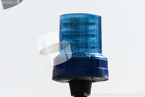 Image of Detail shot of a blue light on a police car