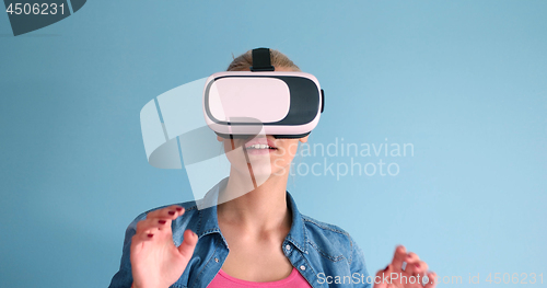 Image of woman using VR headset glasses of virtual reality