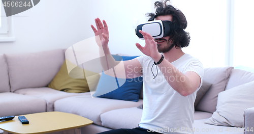 Image of man using VR-headset glasses of virtual reality