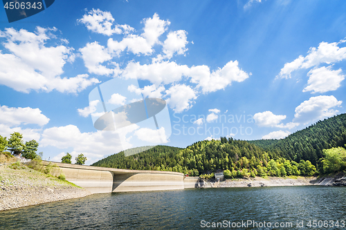 Image of Lake landscape with a dam in summer