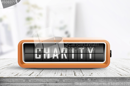 Image of Charity written on an old device