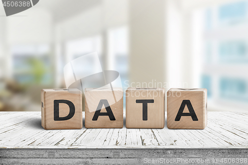 Image of Data sign on a table with white planks