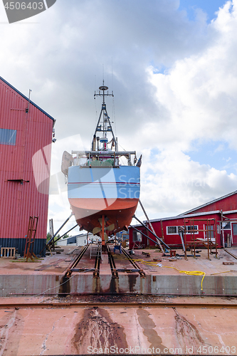 Image of Boat on land at the docks