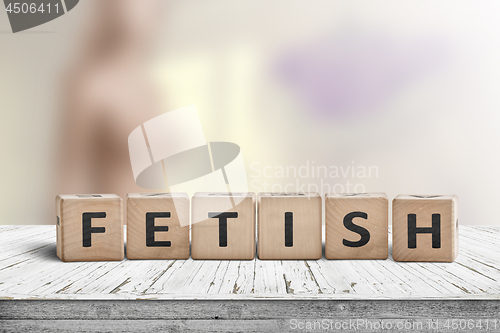 Image of Fetish word on wooden cubes on a table