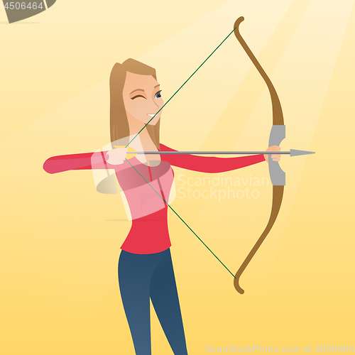 Image of Young caucasian archer training with a bow.