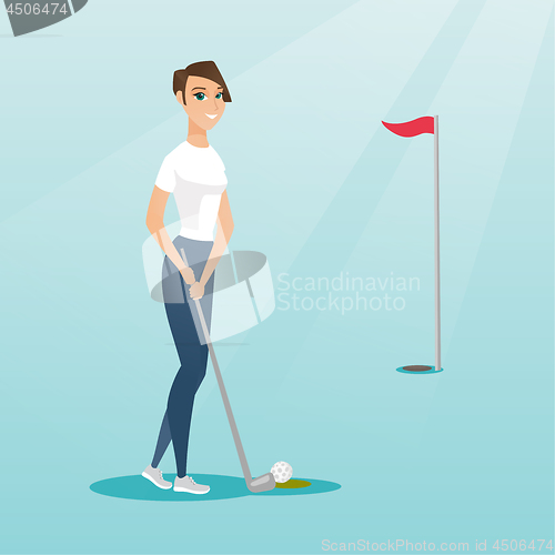 Image of Young caucasian golfer hitting a ball.