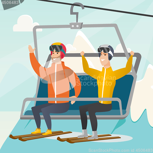 Image of Two caucasian skiers using cableway at ski resort.