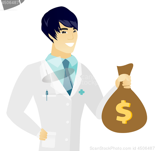 Image of Young asian doctor holding a money bag.