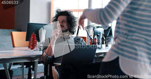 Image of Startup Business Team At A Meeting at modern office building