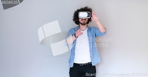 Image of Man using headset of virtual reality