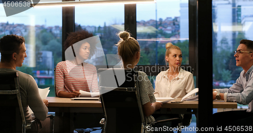 Image of Multiethnic Business Team At A Meeting at modern office building