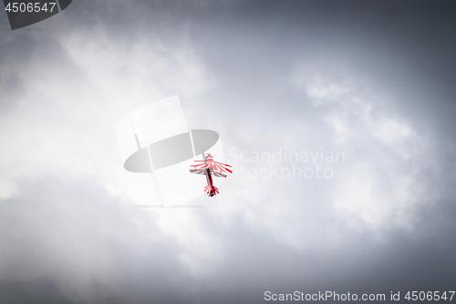 Image of Airplane flying up in cloudy weather