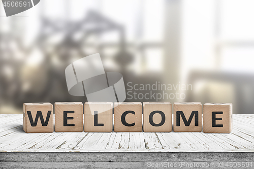 Image of Welcome sign on a table in a lobby