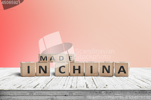 Image of Made in China sign on a wooden desk