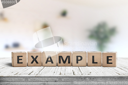 Image of Example sign on a wooden table in a bright room