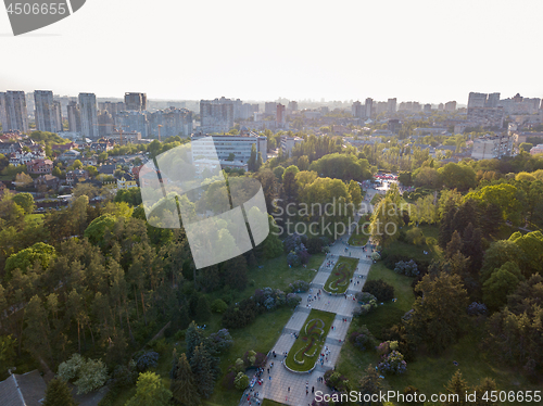 Image of A bird\'s eye view, panoramic view from the drone to the view of the central alley of the Botanical Garden and the construction of the Pechersk district in the city of Kiev, Ukraine