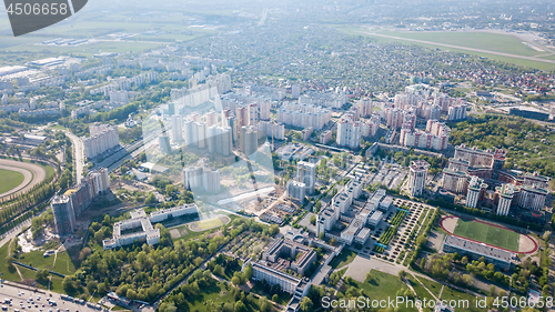 Image of Aerial view, landscape part of the modern city and private homes spring sunny day Kyiv, Ukraine. Photo from drone