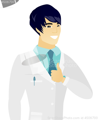 Image of Young happy asian doctor giving thumb up.