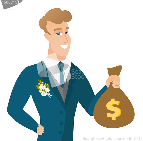 Image of Young caucasian groom showing a money bag.