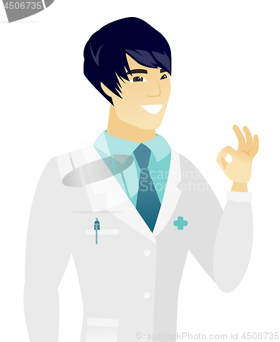 Image of Young asian doctor showing ok sign.