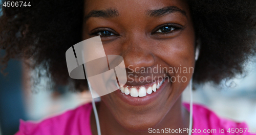 Image of portrait of young afro american woman in gym