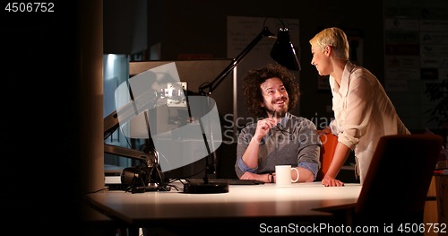 Image of young designers in the night office