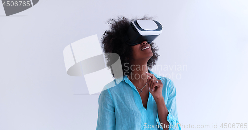 Image of black girl using VR headset glasses of virtual reality