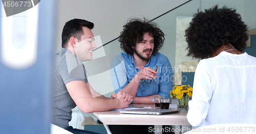 Image of Multiethnic startup business team on meeting