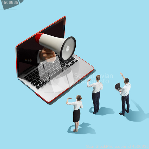 Image of Flat isometric view of businessmen and woman and laptop with male hand with megaphone