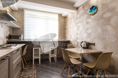 Image of Kitchen interior in a small apartment