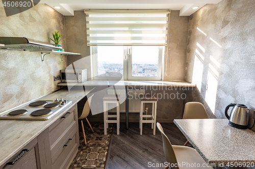 Image of The interior of a small dining room in the hostel