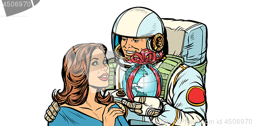 Image of Couple in love. Astronaut gives a woman the Earth isolate on white background