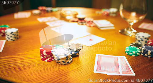 Image of Chips for gamblings, drink and playing cards