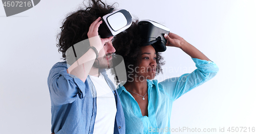Image of multiethnic couple getting experience using VR headset glasses