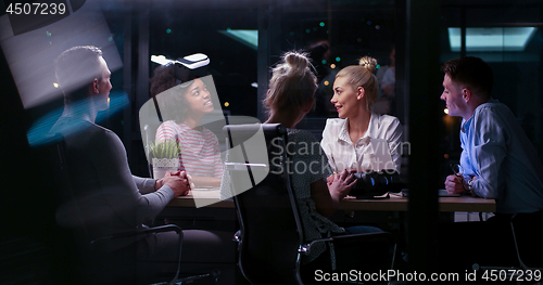 Image of Multiethnic Business team using virtual reality headset