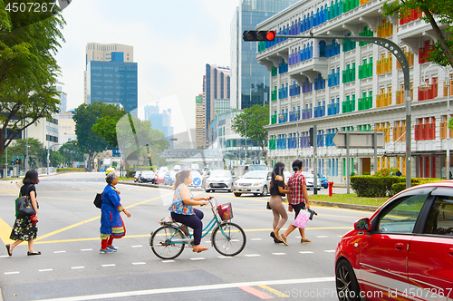 Image of People crossing a road. Singapore