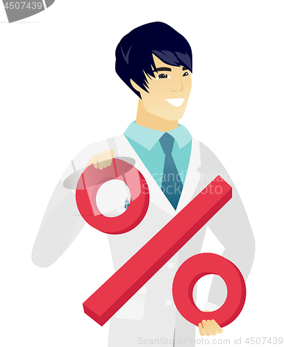 Image of Young asian doctor holding percent sign.