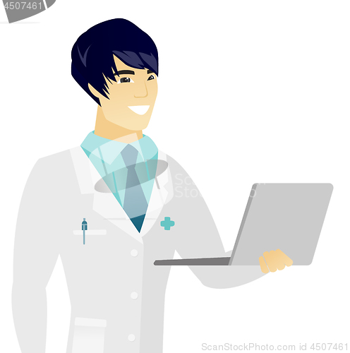 Image of Young asian doctor using a laptop.