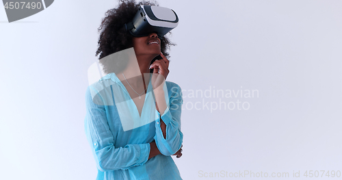 Image of black girl using VR headset glasses of virtual reality