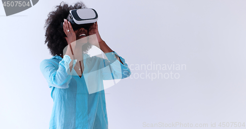 Image of black girl using VR headset glasses of virtual reality