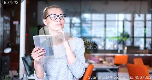 Image of Businesswoman using tablet
