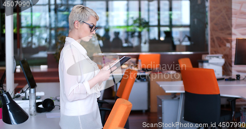 Image of Businesswoman using tablet