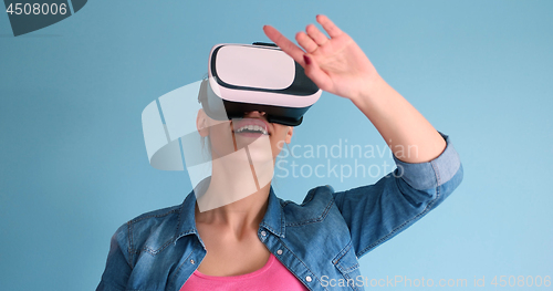 Image of woman using VR headset glasses of virtual reality
