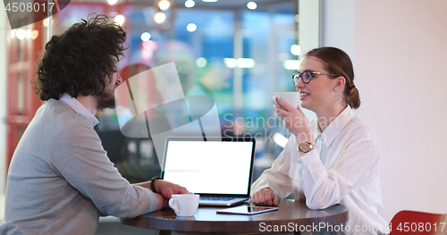 Image of Business People Working With laptop in office