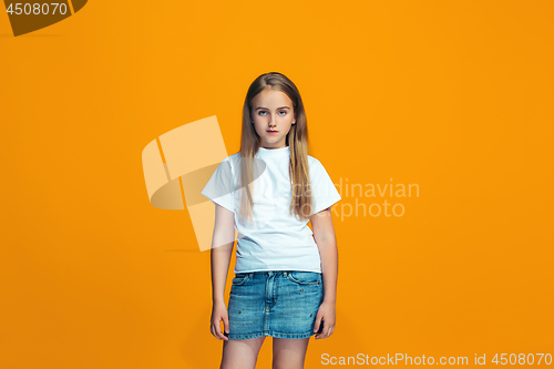 Image of Young serious thoughtful teen girl. Doubt concept.