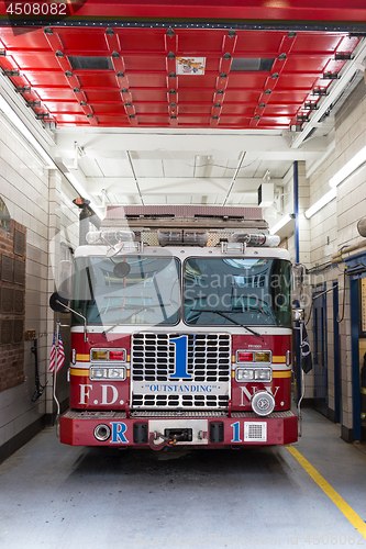 Image of New York fire department trucks parked in fire station on 18th of May, 2018 in New York City, USA.